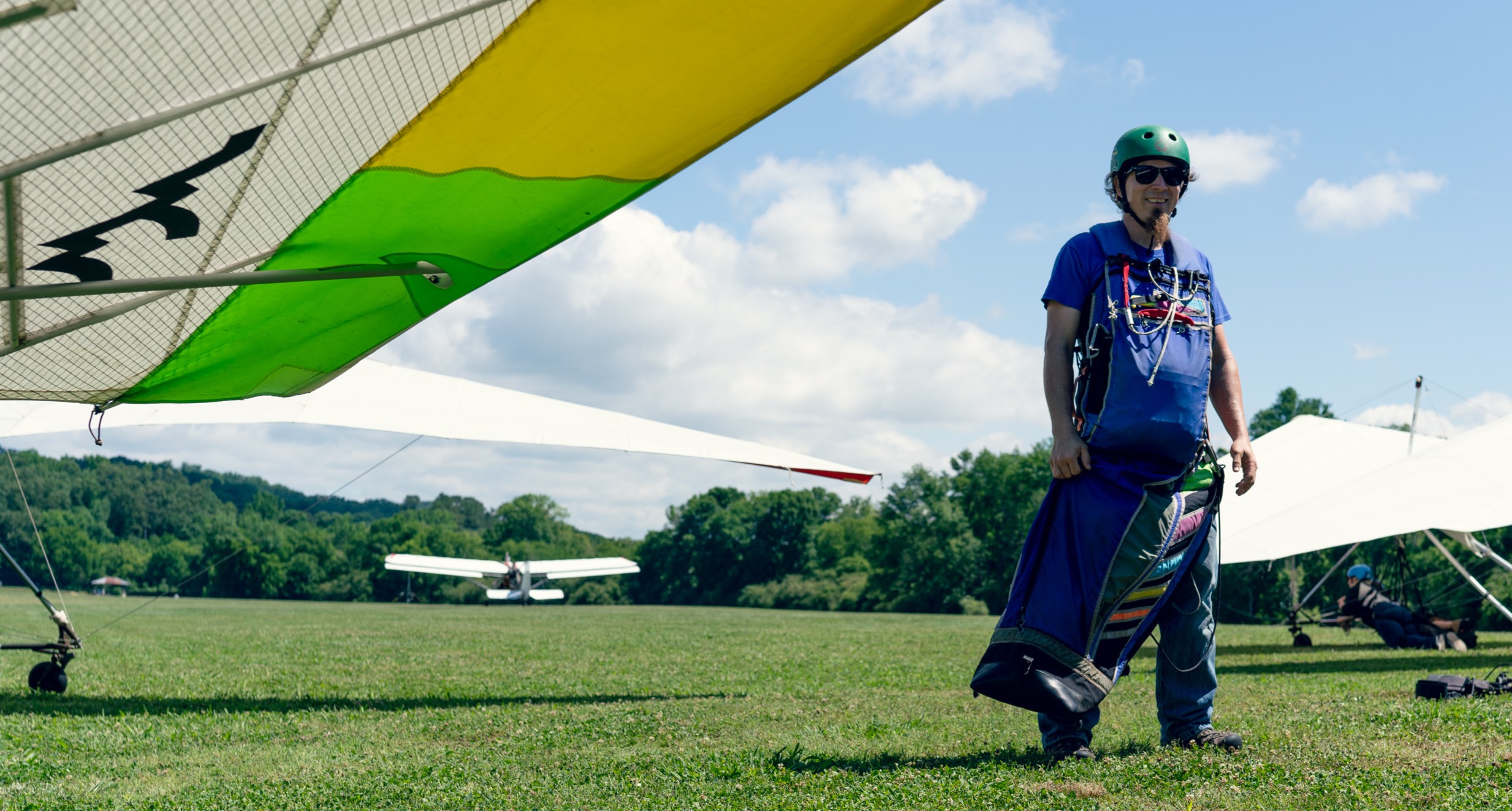 Pilots gathered for a hang gliding tournament